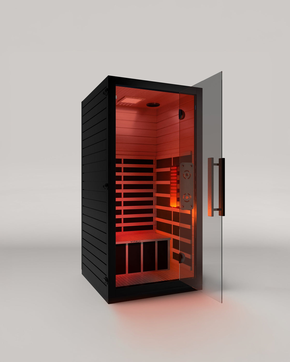 Black XEN Infrared Sauna with red interior lighting on a gray background